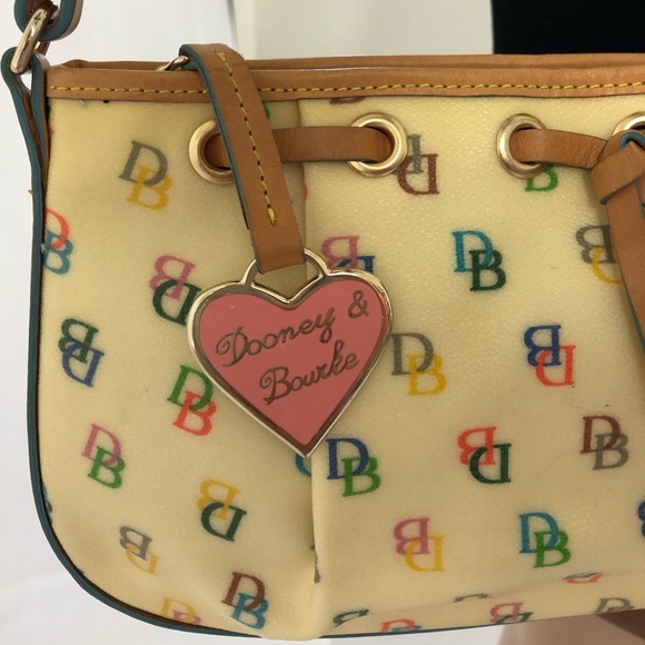 Dooney & Bourke second hand with stain - Picture 3 of 11